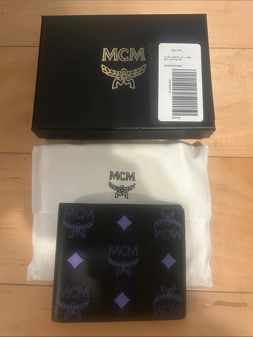 MCM Black Leather Bi-Fold Wallet with Purple Logo Print